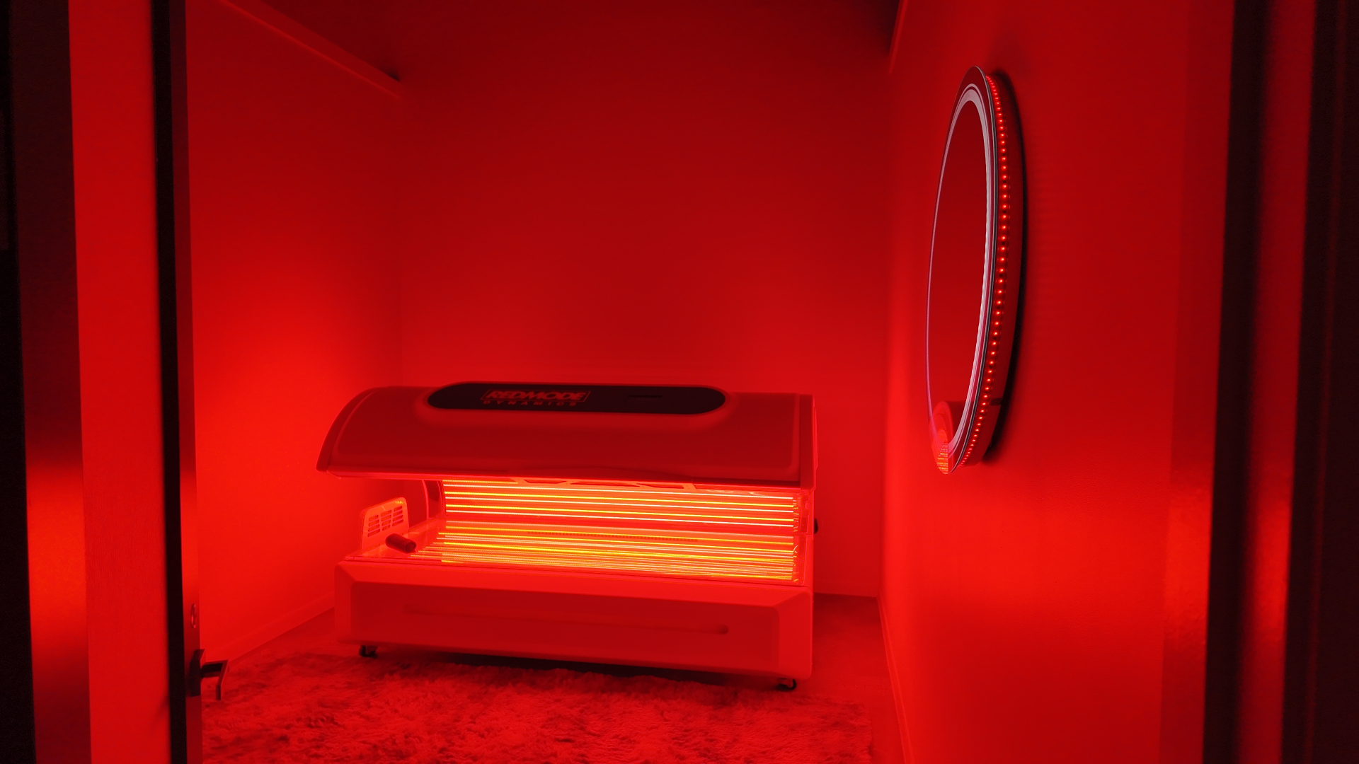 Red light therapy pro bed treatment room at REDSOL Wellness Club in League City Texas
